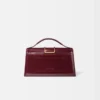 The large Bambino Cross-body metal flap bag