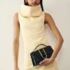 The large Bambino Cross-body metal flap bag