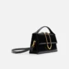 The large Bambino Cross-body metal flap bag