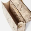 The large Bambino Cross-body metal flap bag