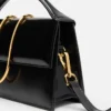 The large Bambino Cross-body metal flap bag