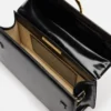 The large Bambino Cross-body metal flap bag