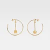 The Nodo hoops earrings Asymmetric hoop earrings The Nodo hoops earrings Asymmetric hoop earrings